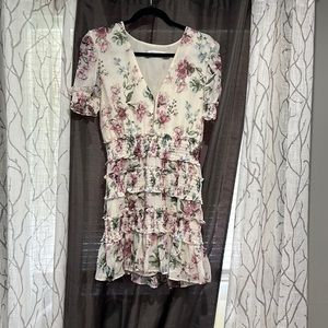 Medium flower dress. Needs one small loop replaced for clasp(pictured)